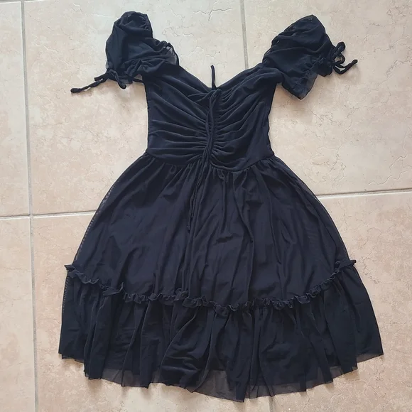 Elegant Black Dress with Sheer Sleeves - Picture 6 of 14